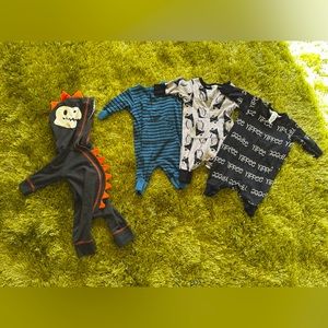 4 Newborn outfits.